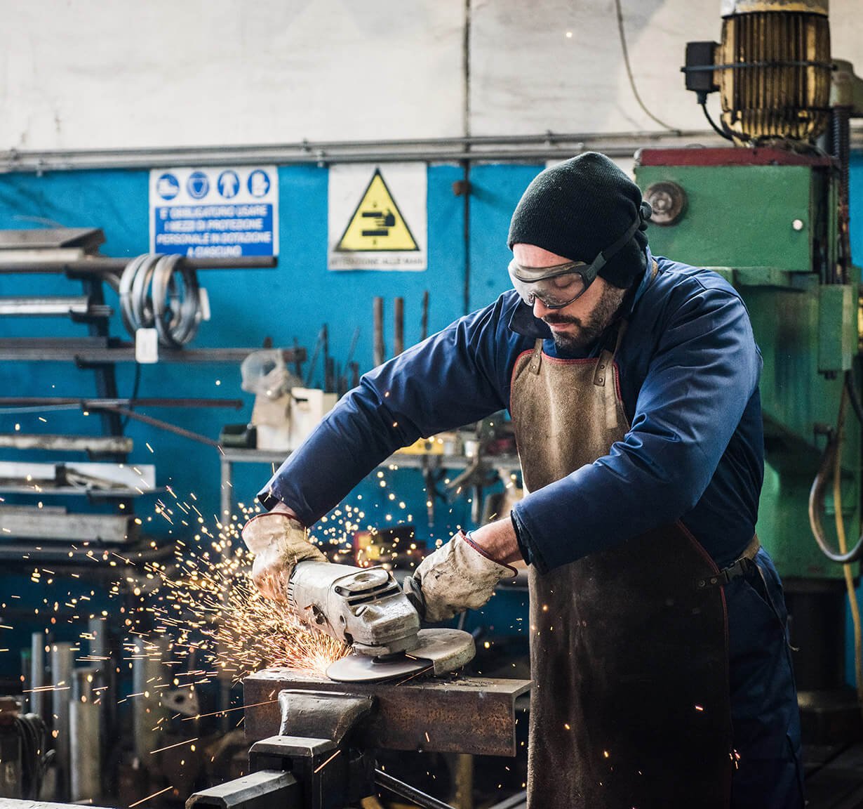 Worker with Grinder